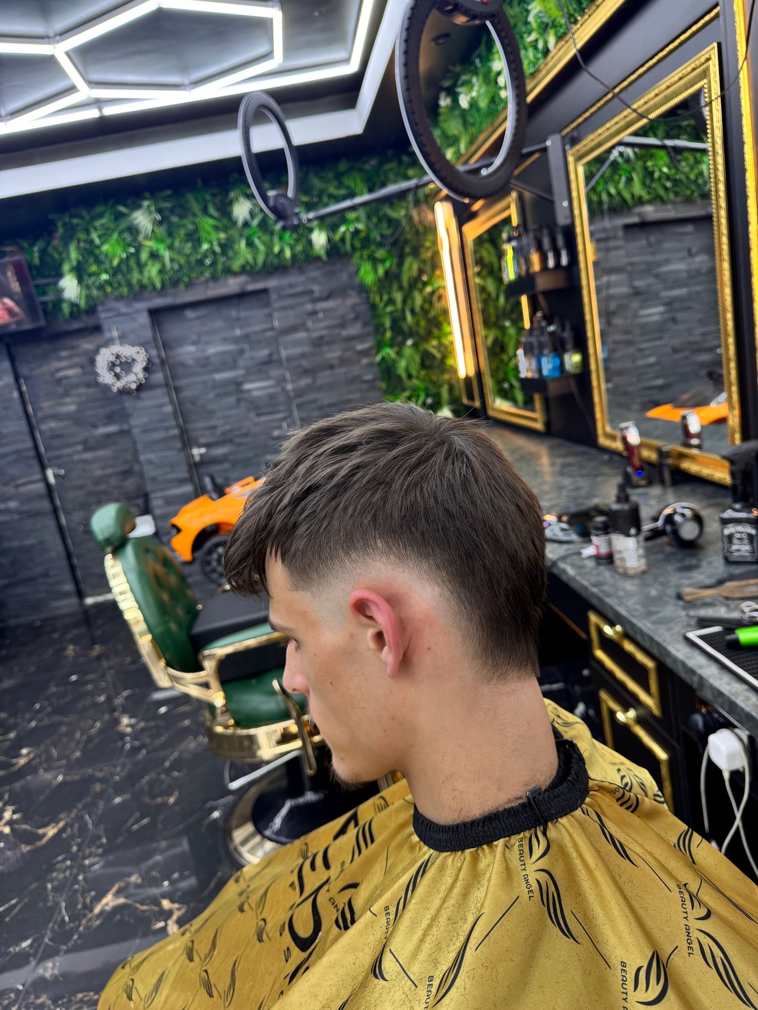 Short finished haircut with a neat side fade